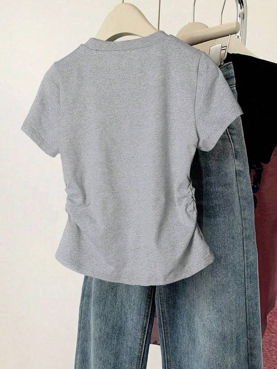Camiseta informal minimalista con lazo rosa y volantes en la cintura para niña preadolescente de Wildeya