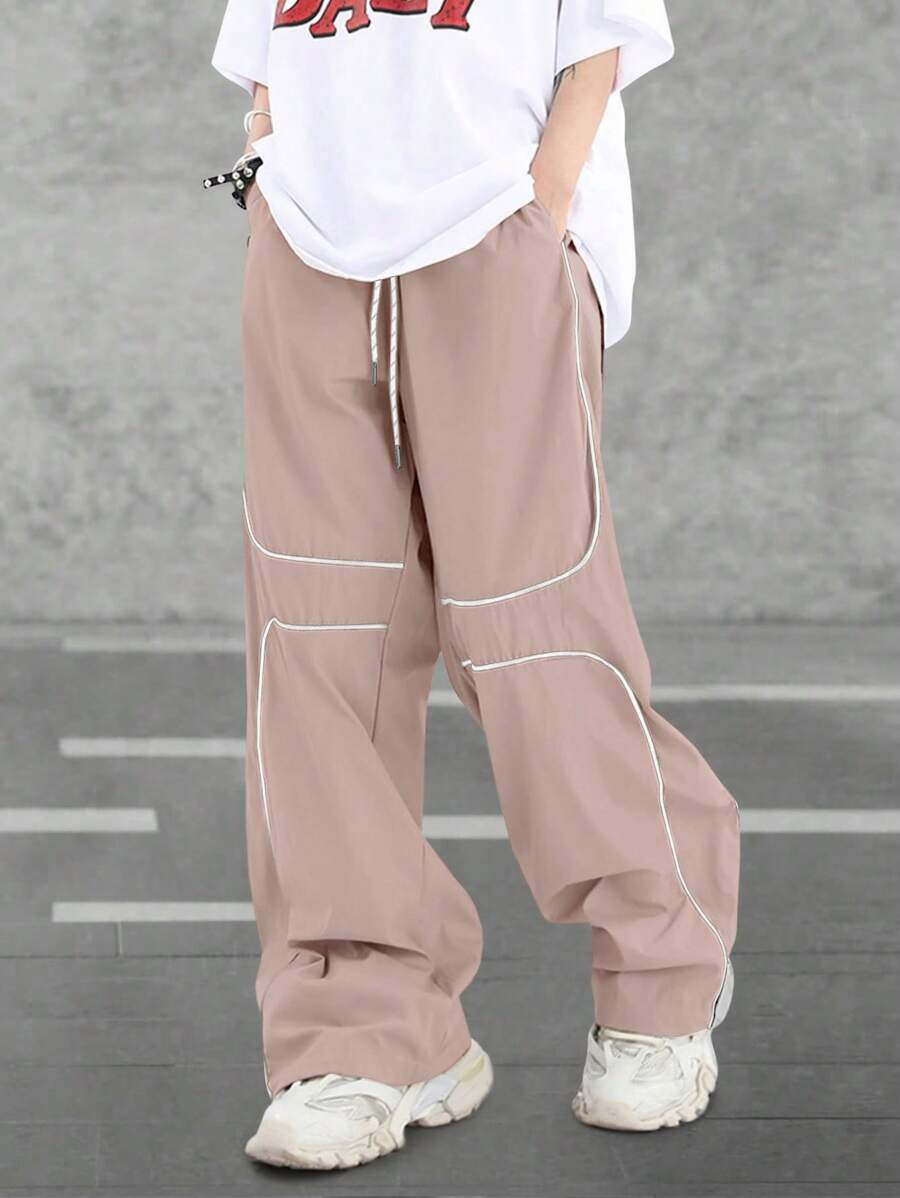 Pantalones extragrandes con cintura con cordón y ribete en contraste para hombre de Manfinity Hypemode