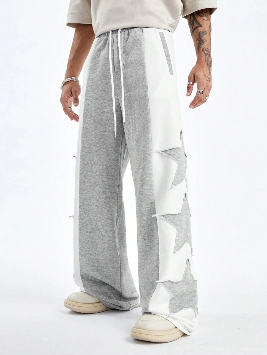Pantalones deportivos largos, holgados y de pierna ancha con parches de doble estrella para hombre de AXEPEAK