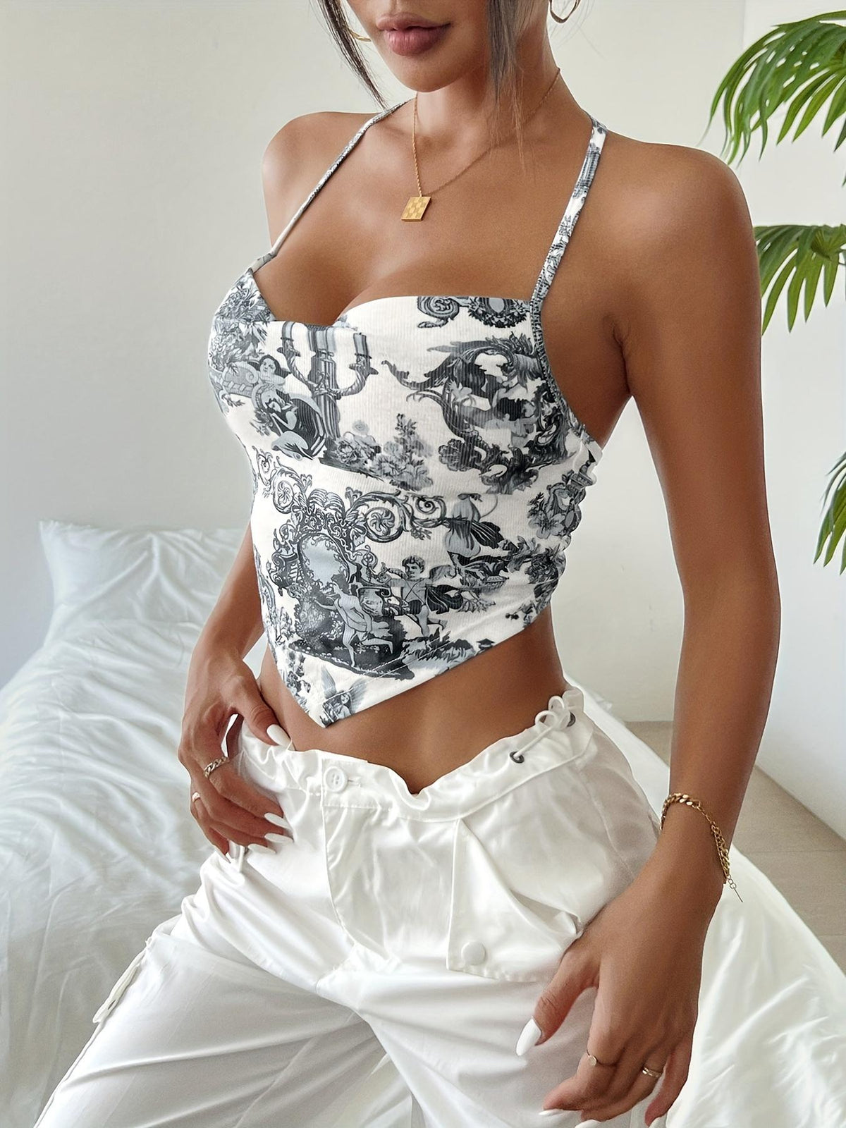 Top de verano con cuello halter drapeado y estampado floral TECCULI EZwear